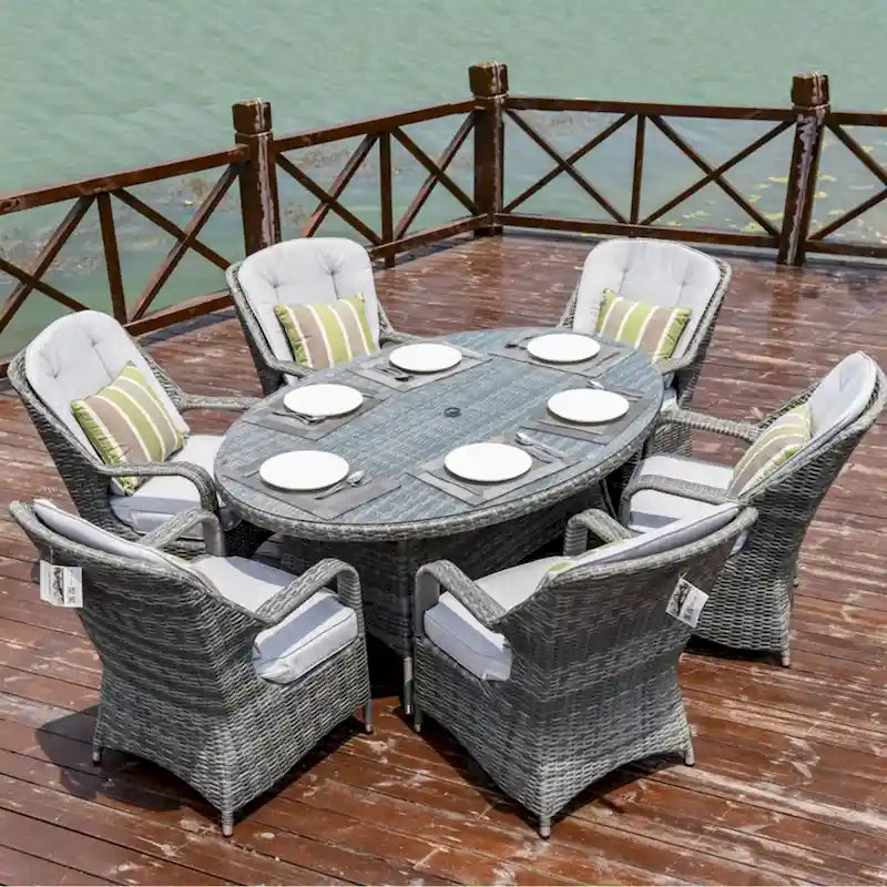 Moda 7-Piece Patio Wicker Oval Dining Table Set with Cushions